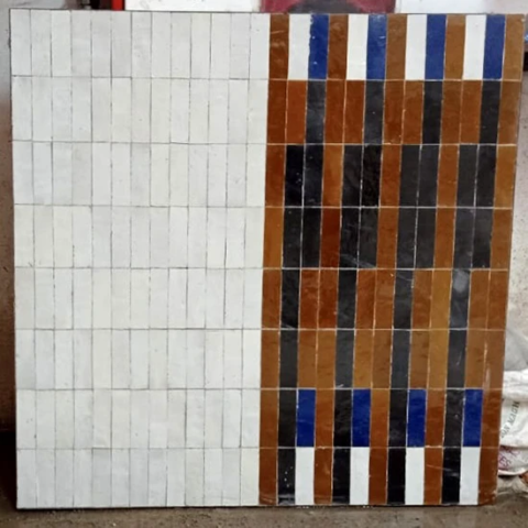 Création manuelle de panneaux de table en zellige